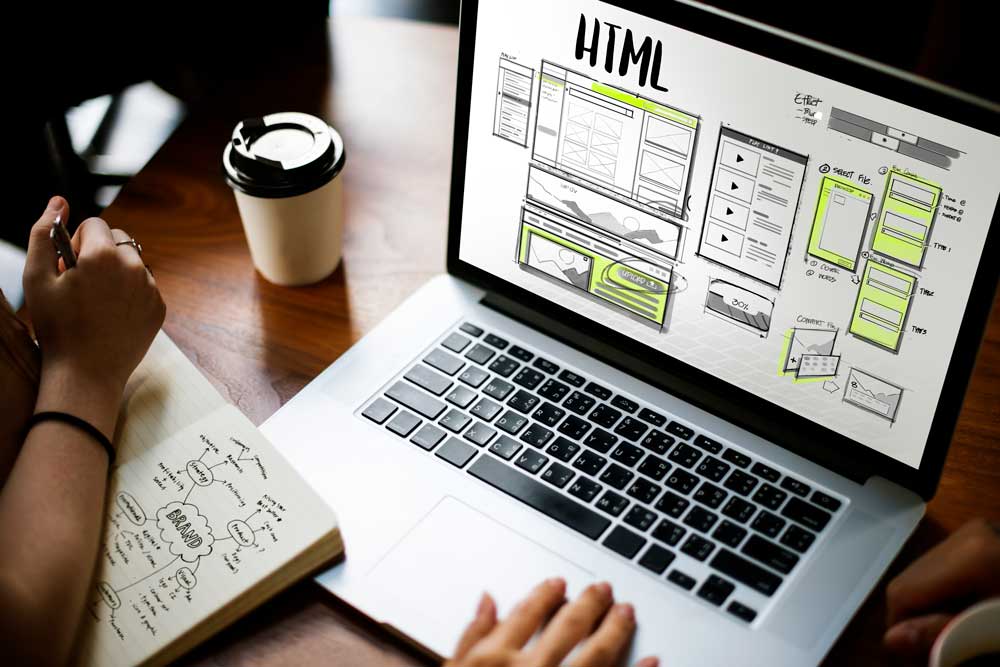 indianapolis web development supports business goals image shows open laptop