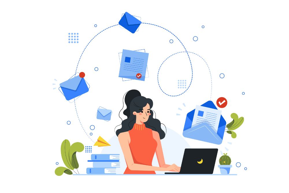 businesses should use email marketing in driving repeat business image shows woman at desk